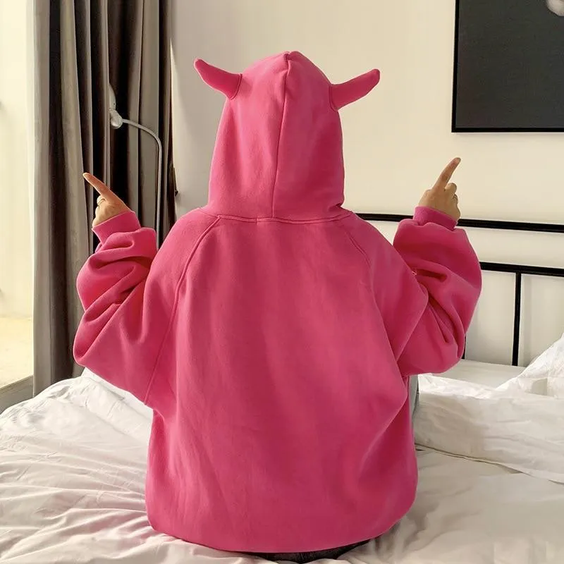 Devil Horns Women's Hoodie: Devilishly fun streetwear